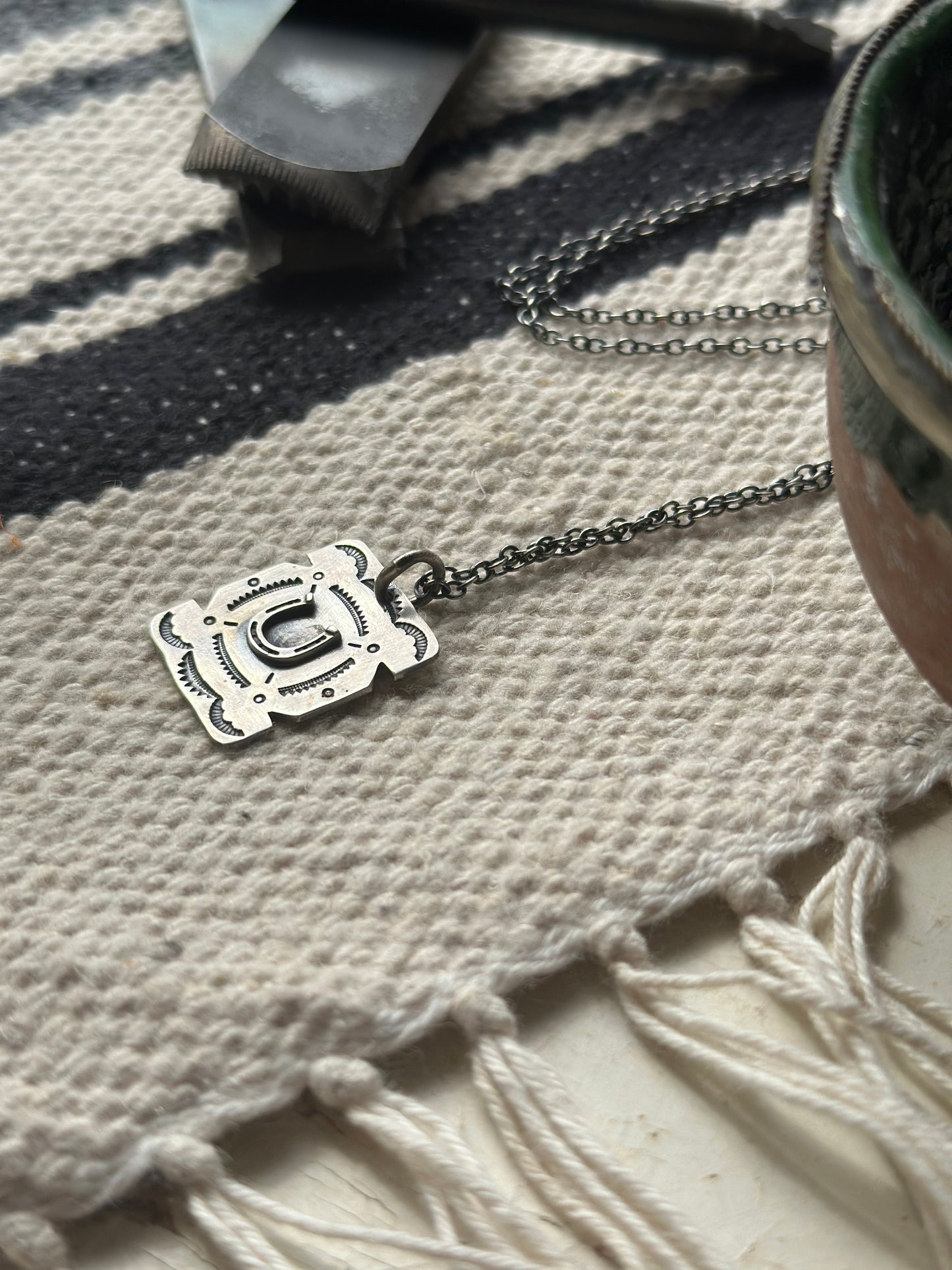 Collier “fer à cheval”